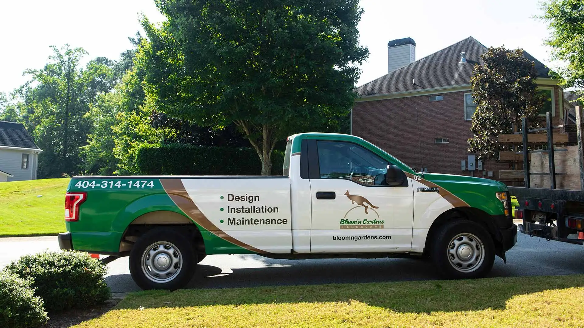 A Bloom’n Gardens Landscape work truck after completing a landscaping project in Atlanta, GA.