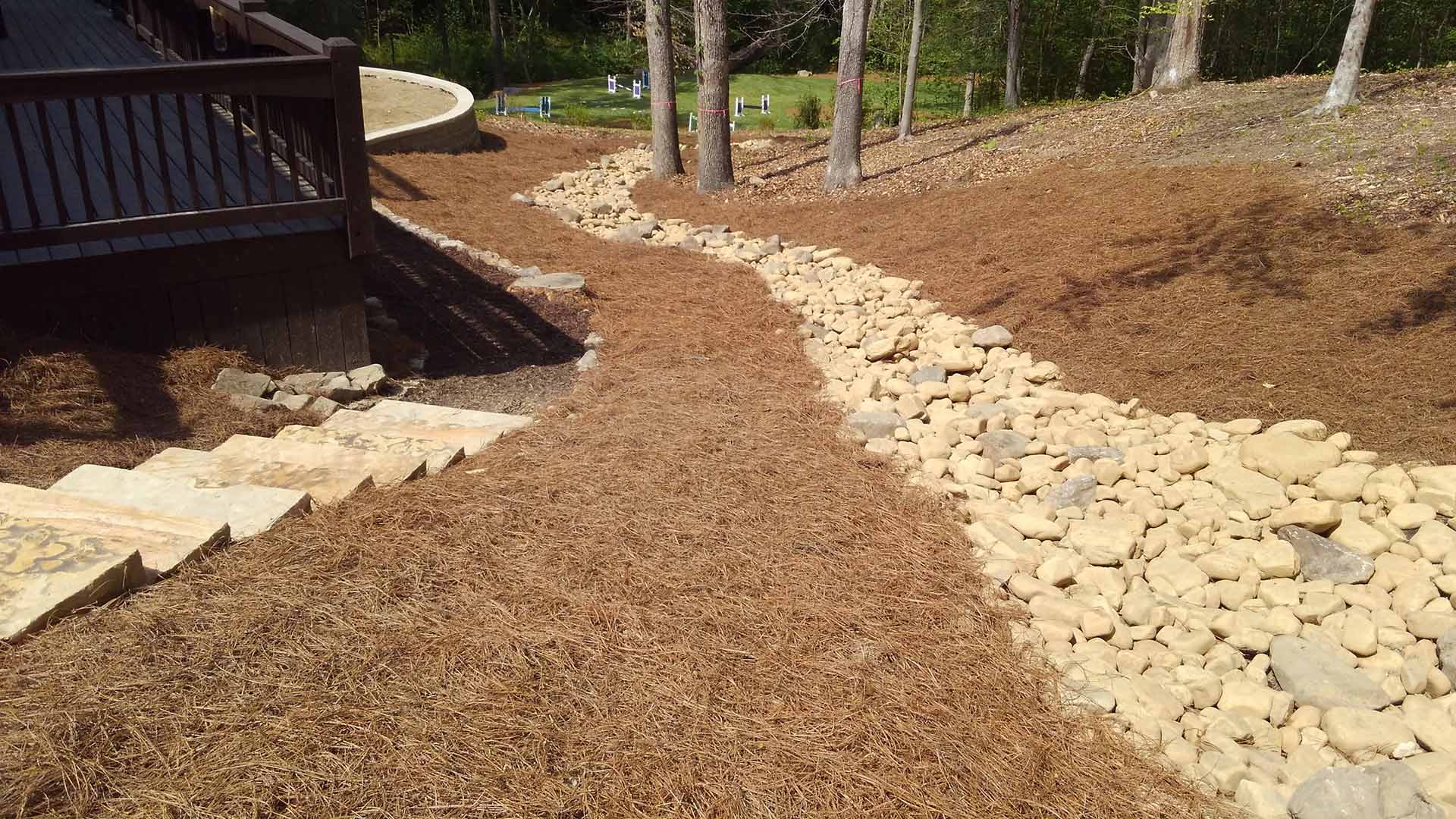 Dry creek bed drainage feature installed near Atlanta, GA.