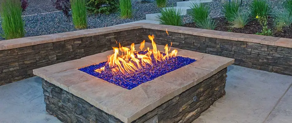 Fire pit installation with seating wall in Atlanta, GA.