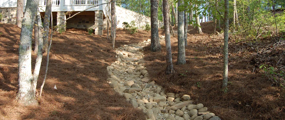 A dry creek bed used for drainage installed at a home in Buckhead, GA.
