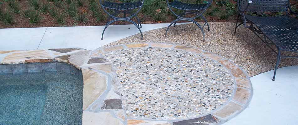 Custom pool patio installation with flagstone in Lithia Springs, GA.