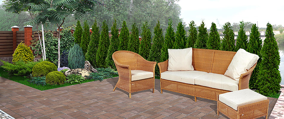 3D landscape design rendering of landscape bed and outdoor patio with furniture in Smyrna, GA. 