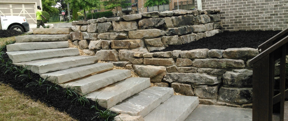 Retaining wall with outdoor steps installed for clients in Milton, GA.