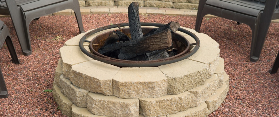 Wood-burning fire pit installed for backyard in Peachtree City, GA.